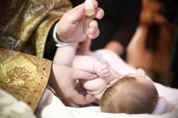 Trei copii sărmani din Cumpăna, botezați de Florii